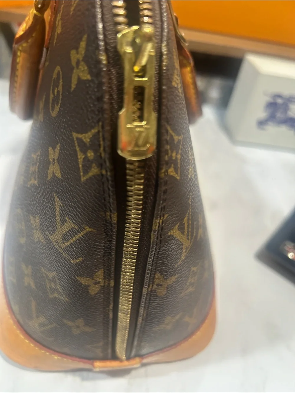 Louis Vuitton Monogram Alma Satchel in Brown and Tan